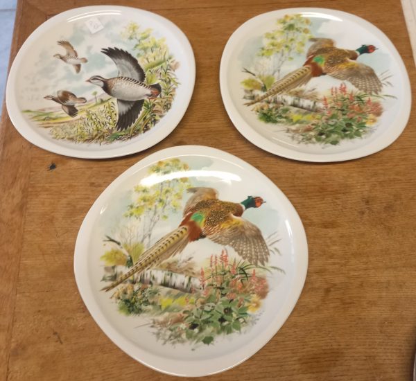 3 Assiettes avec une image d'oiseaux.