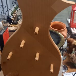 Porte-ustensile en bois en forme d'oiseau.