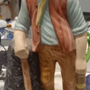 Statuette d'un mineur en résine.